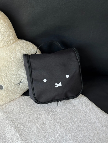 Capacious handheld cosmetic bag to go out