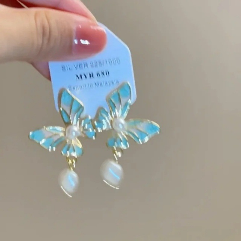 ニッチなデザインの高級ブルーバタフライパールイヤリング、女性用、2025年夏の新作人気ファッションイヤリング