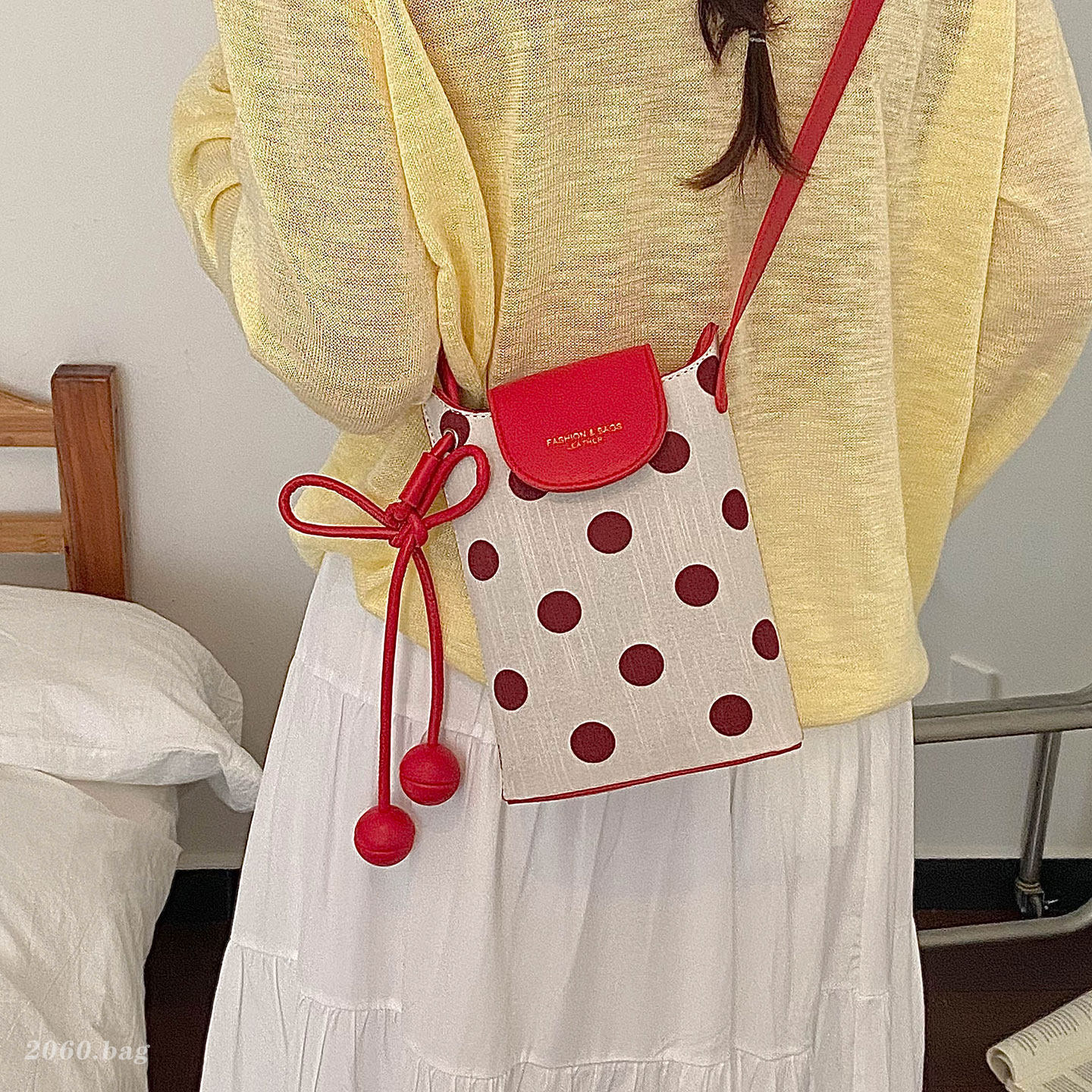 Un hombro de moda de viaje nuevo punto de onda bolso superfuego bolso de mochila para mujeres verano 2026 sensación coreana