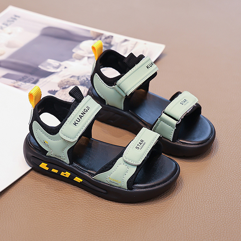 Niños huecos zapatos de playa de dedo abierto 2026 verano nuevo estilo de moda infantil sandalias versátiles sandalias de niños mayores
