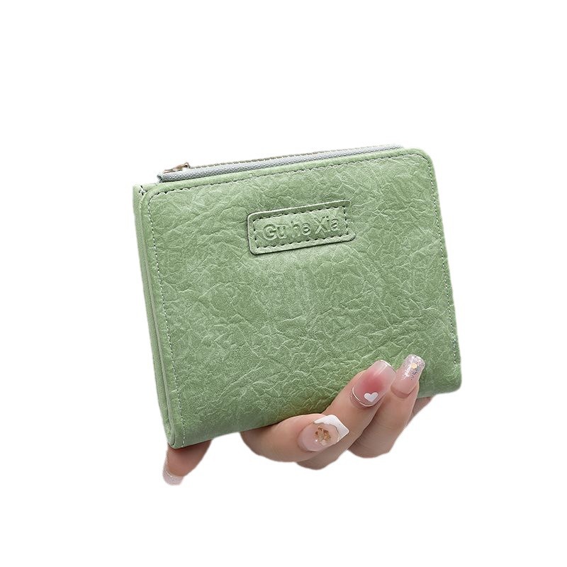 Nuevo retro pequeña cartera ~ ins cartera femenina corto estudiante europeo y americano fresco plegable simple hebilla artística