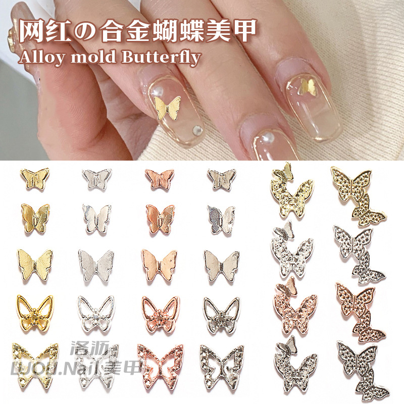 Nueva mariposa japonesa joyería de uñas en línea celebridad aleación tridimensional mariposa de una pieza mini mariposa hueca decoración de uñas