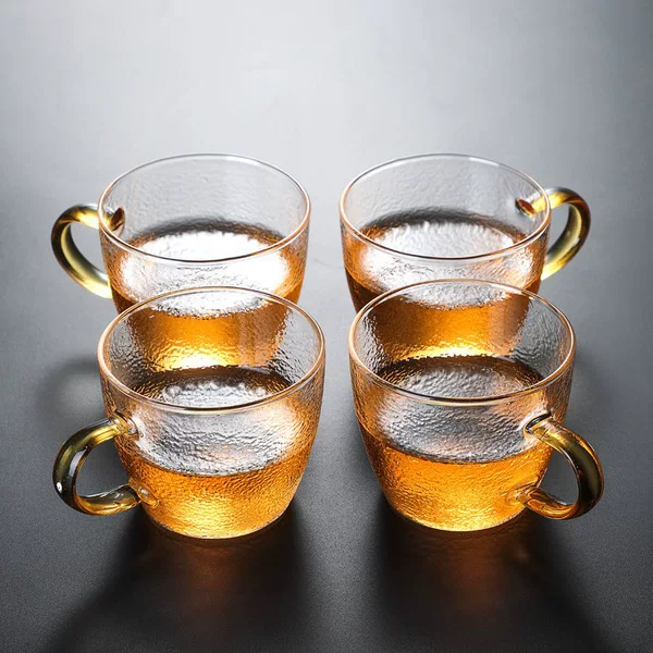 Set of 4 hammered handle cups