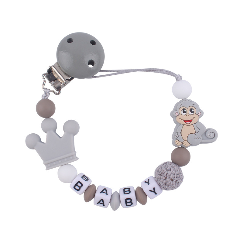 Nuevo bebé suministros de dibujos animados animal mono mordedor creativo bebé DIY mordedura molar Cadena de pezón cadena anti-caída
