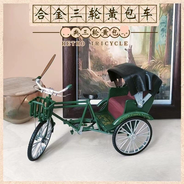 Green three-wheeled bike