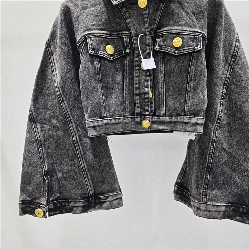 Estación europea 2026 primavera nueva solapa hebilla delgada nicho de diseño elástico lavado con agua chaqueta corta vaqueros moda