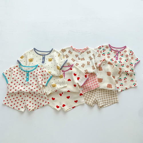 Korean style children's clothing for boys and girls, cartoon printed short-sleeved shorts set, baby summer thin home clothes two-piece set
