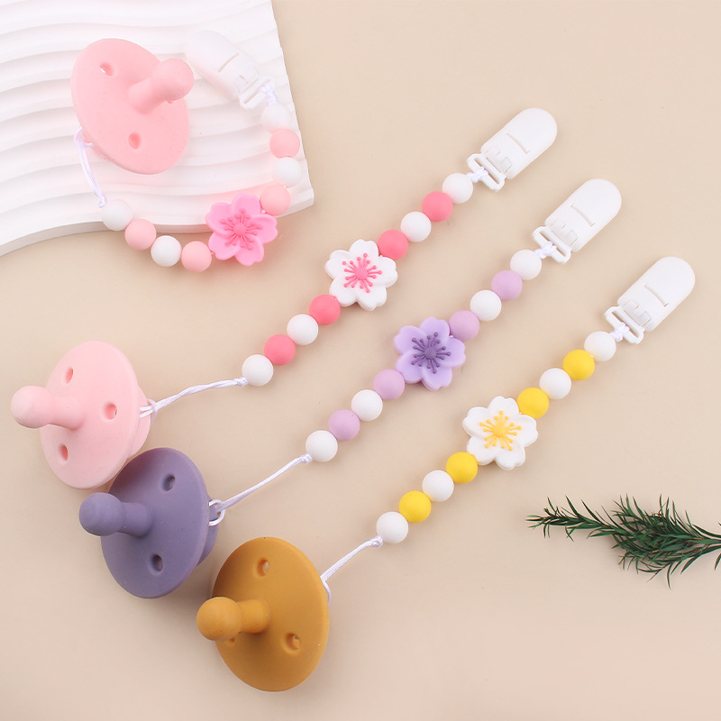 Productos para bebés Clip de chupete de plástico de bricolaje para bebés Flor de begonia creativa gel dental de silicona Chupete anti-caída de la cadena