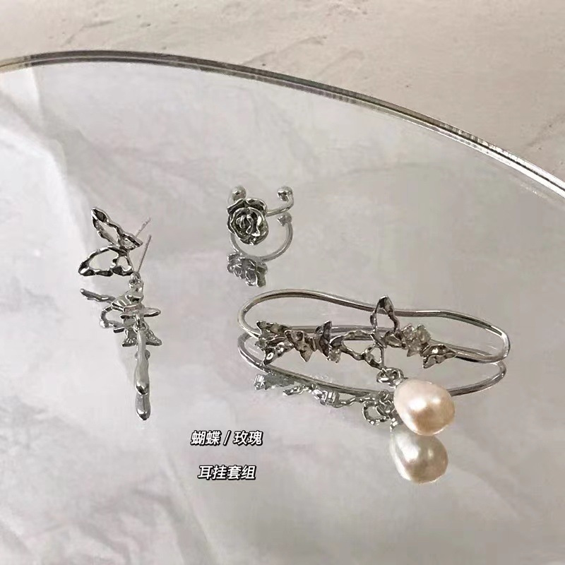 Europa y los Estados Unidos transfronterizos mariposa pearl clip set sin agujeros de orejas clip de hueso de orejas colgantes de orejas de borda de alta calidad nicho orejas