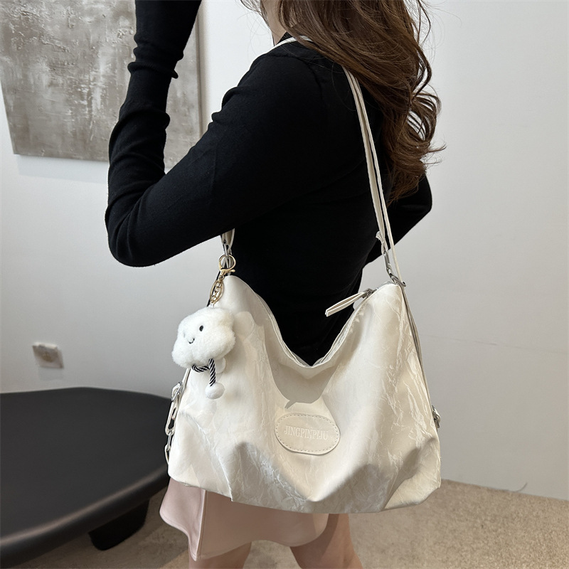 Bolsa de sensación relajada, bolsa de mujer, gran capacidad de verano, 2024, nueva bolsa de viaje de hombro de un solo tipo