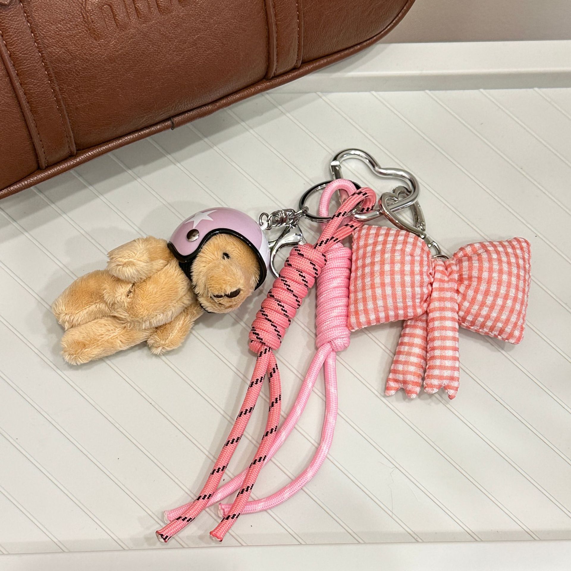 Muay Thai adorable bolso colgante creativo bolso colgante bolso escolar de pareja llavero decoración casco de alto nivel oso universal