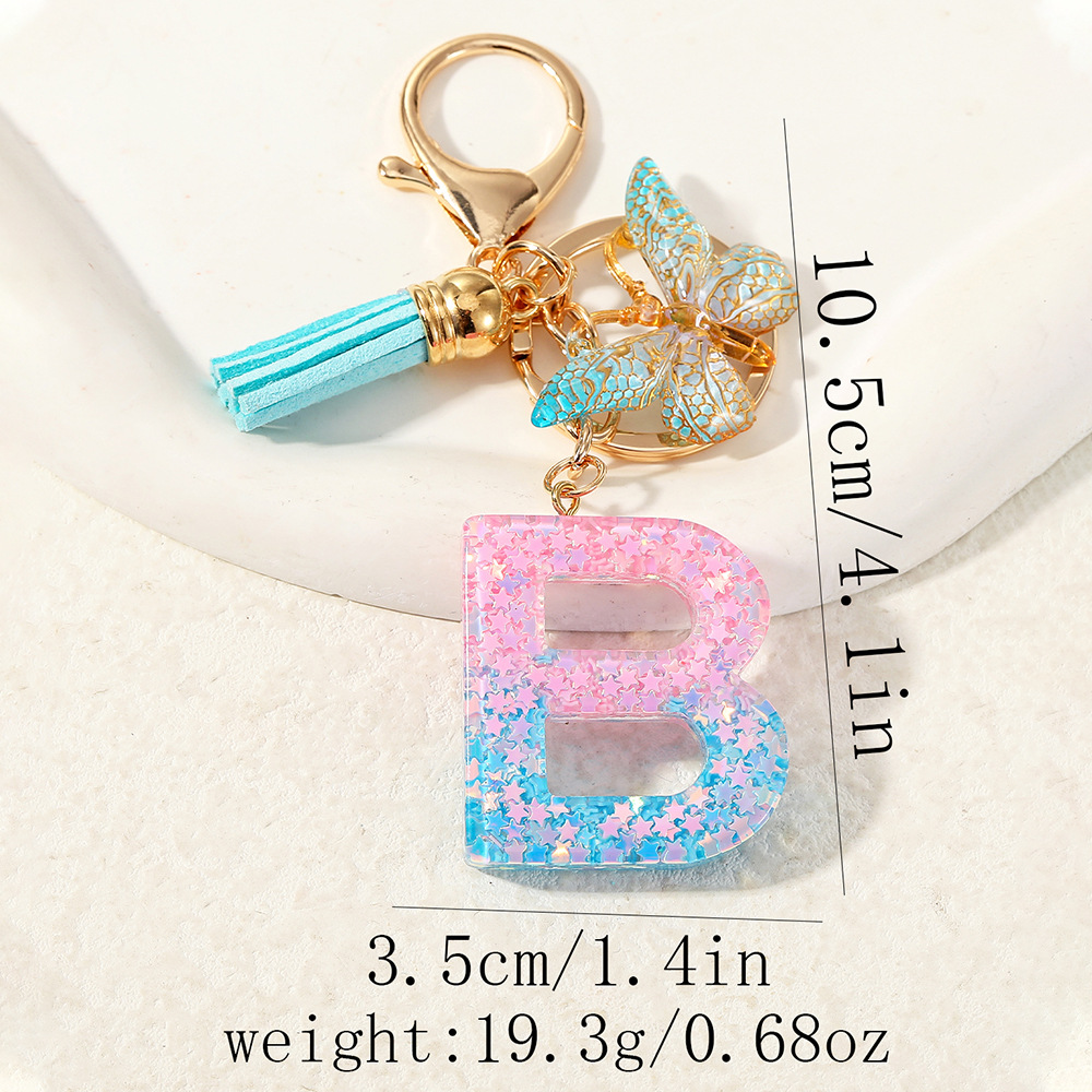 Europa y los Estados Unidos transfronterizos nuevos cristal sequinado goteo de goma letras inglesas joyería llavero y bolsos colgante apoyo al por mayor