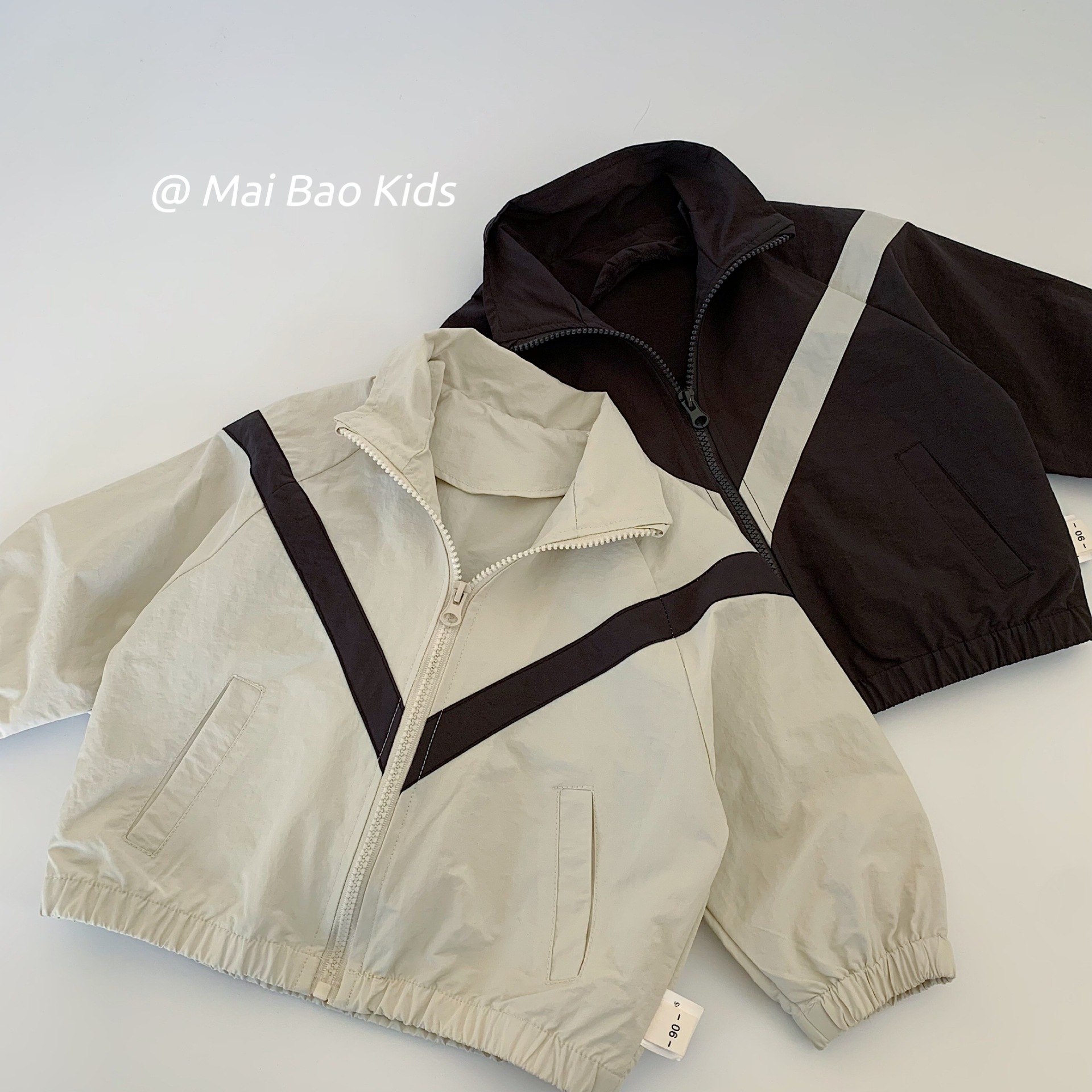 Mai Bao chaqueta infantil de otoño 2025 nuevos productos de estilo simple color con cremallera cardigan para hombres y mujeres chaquetas de estilo exterior
