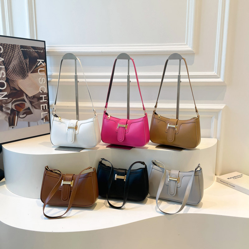Bolso de brazo retro de alta calidad para mujeres 2025, nuevo bolso de mujer, bolso de hombro de moda, simple bolso de estilo exterior.