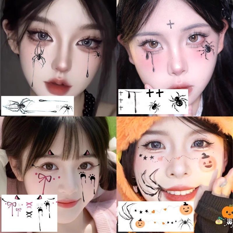 ハロウィーンのキラキラカボチャのタトゥーは小さな悪魔の目尻のメイク顔のシールの小さな魔女の顔のタトゥーを貼っています|undefined