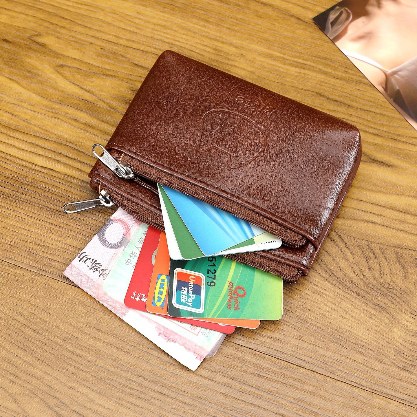 Suministro transfronterizo nuevo gato hecho a mano bolso de cambio de cuero lindo mini auriculares portátiles bolsa de tarjeta pequeña al por mayor