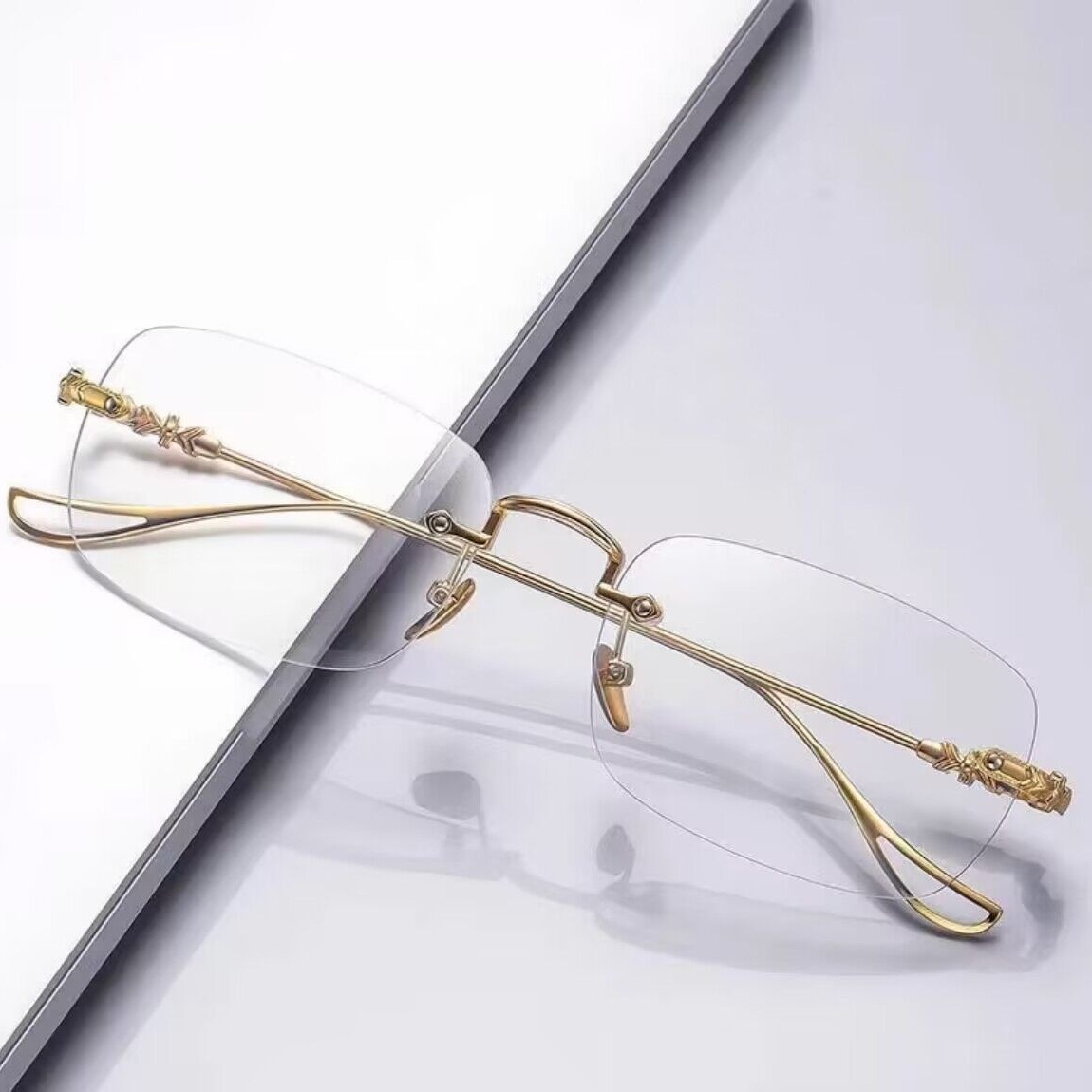 2025 tendencia de diseño avanzado gafas sin marco de moda juvenil versátil nuevas gafas anti-luz azul