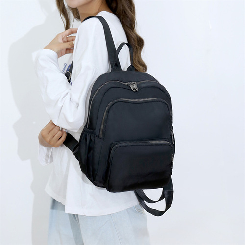 Casual minimalist daily travel backpack for women, lightweight and easy to carry, large capacity fashionable mom bag, waterproof nylon fabric bag
