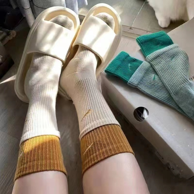 Suwan niester color socks stitching towel bottom couple sports fashion tube high tube cotton socks wholesale