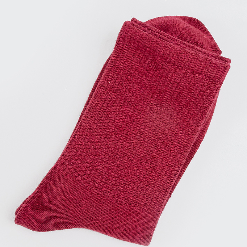 Calcetines de mujer para primavera y otoño, calcetines de algodón de color liso, versátiles y a la moda, calcetines holgados, calcetines de longitud media, calcetines deportivos que absorben el sudor, venta al por mayor.
