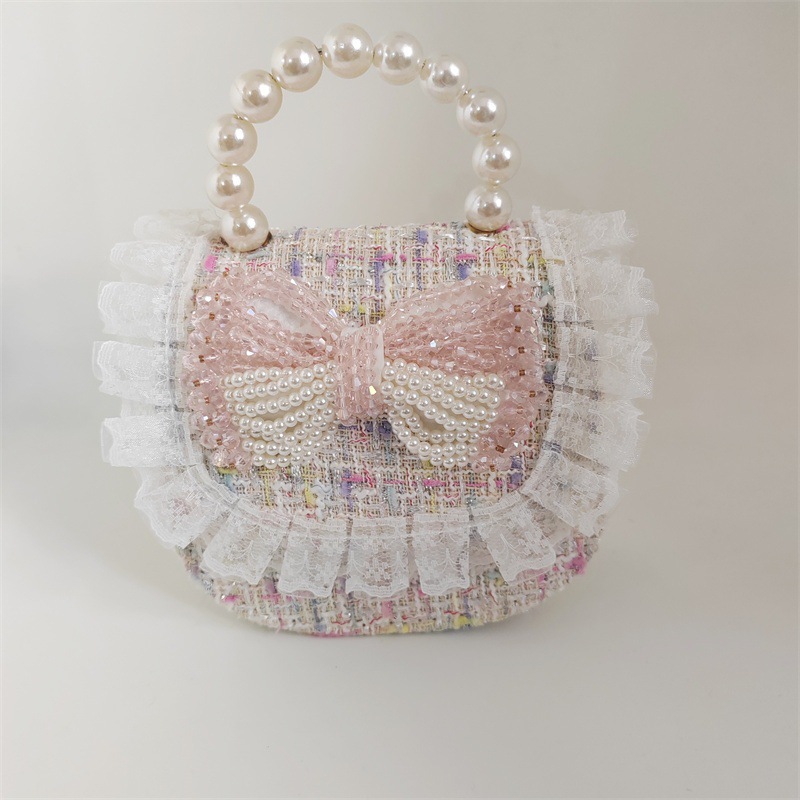 2025 primavera y verano estilo caliente moda casual niños dulces bolsa de gelatina mini bolso de mensajero de un solo hombro variedad al por mayor