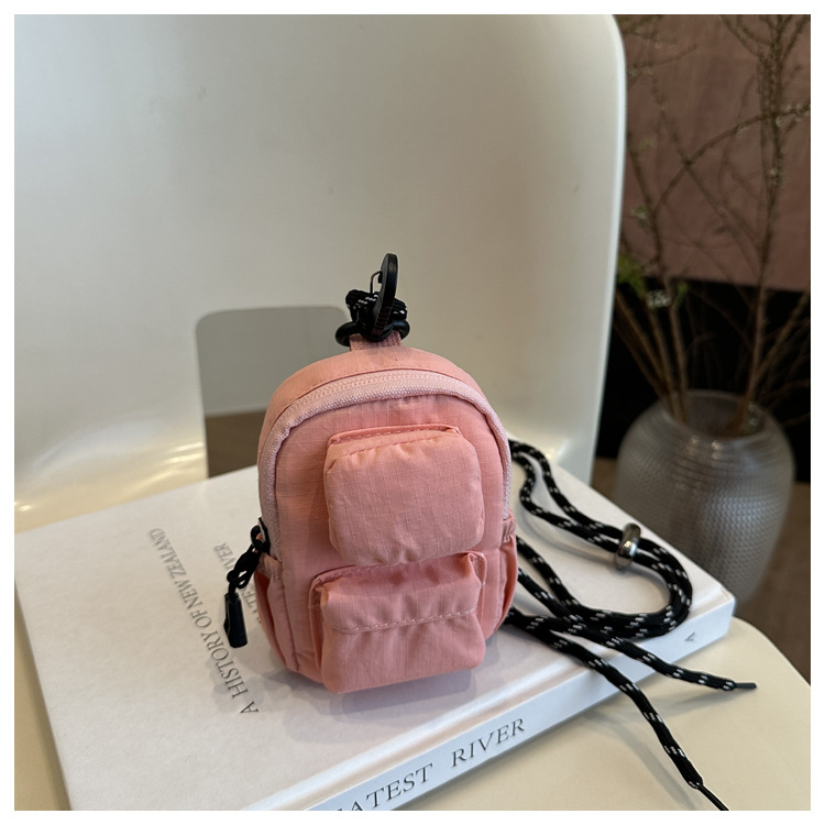 Mini colgante bolso de cambio 2025 nuevo cross-border nylon impermeable bolso de auriculares de bolsillo de hombro