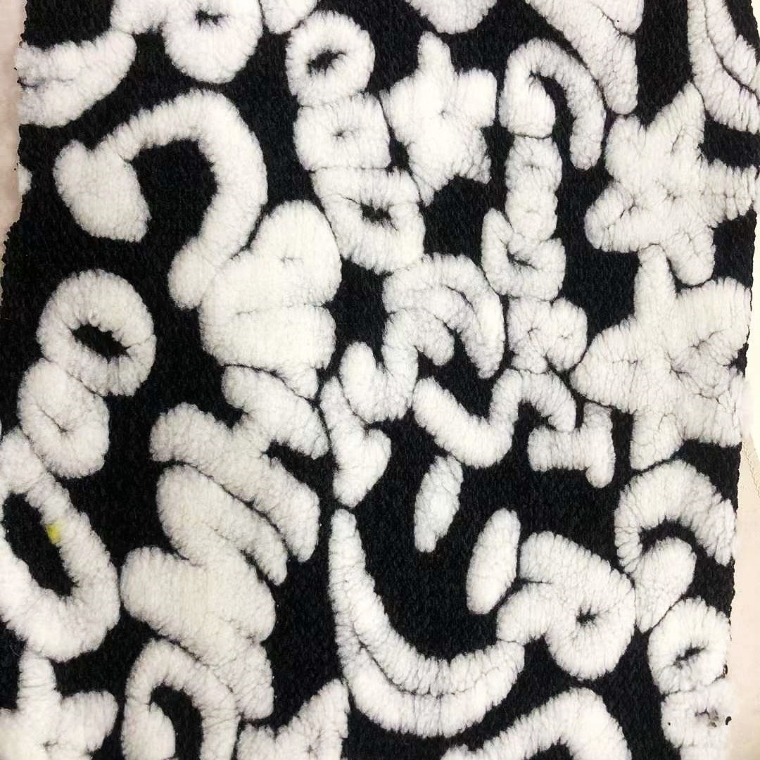Inventario de cordero diamante Jacquard tela granular de lana estrella de luna Jacquard ropa de otoño y invierno zapatos juguetes tela sombrero