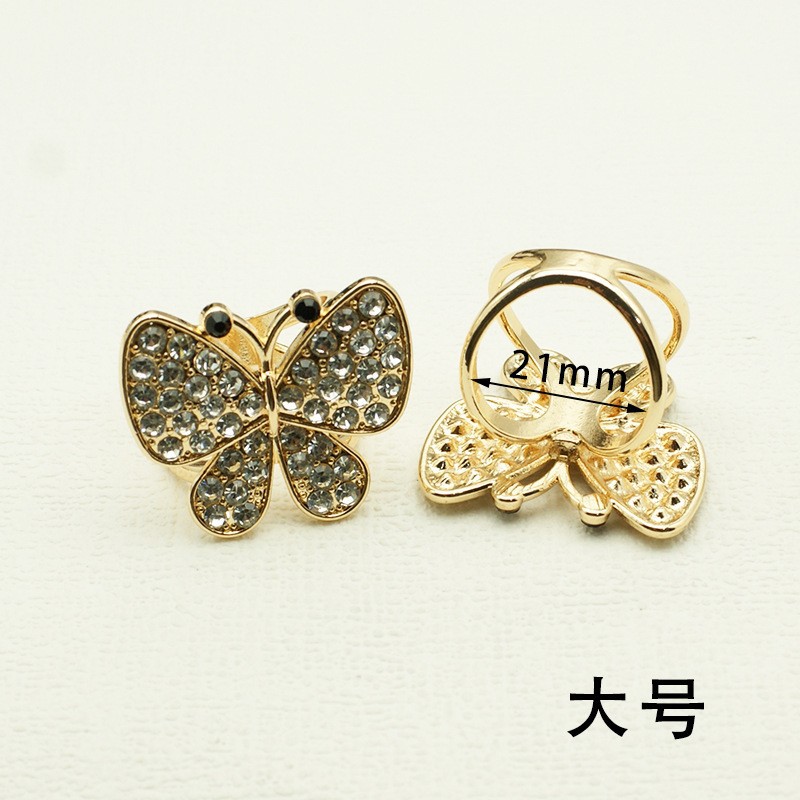 Corea del Sur multi-funcional bufanda hebilla de alta calidad perla moda nueva Camelia windbreaker cinturón hebilla de alta gama joyería al por mayor