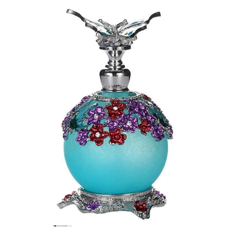 AliExpress Venta caliente mariposa 20ml botella de aceite de gran capacidad sub-embotellado botella de perfume de aleación de zinc botella de decoración al por mayor