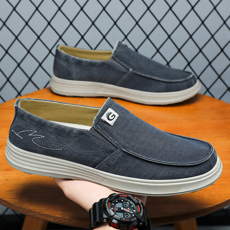 Zapatos para hombres de verano nuevos zapatos de lona al por mayor zapatos casuales de un pedazo de zapatos de trabajo transpirables coreanos viejos zapatos de tela de Beijing