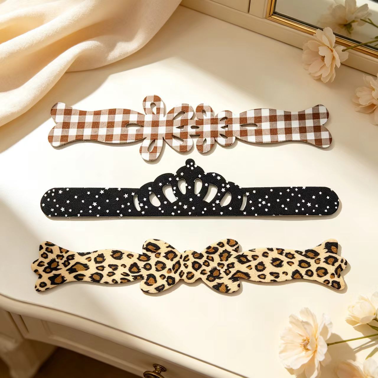 Korean-style leopard print bangs with bow, plaid, star, and crown designs – a magical side-swept hair accessory for washing your face and applying makeup – wholesale