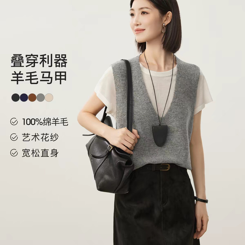 Layering essential: 100% merino wool seamless V-neck knit vest, a versatile and elegant solid-color pullover Layering essential: 100% merino wool seamless V-neck knit vest, a versatile and elegant solid-color pullover