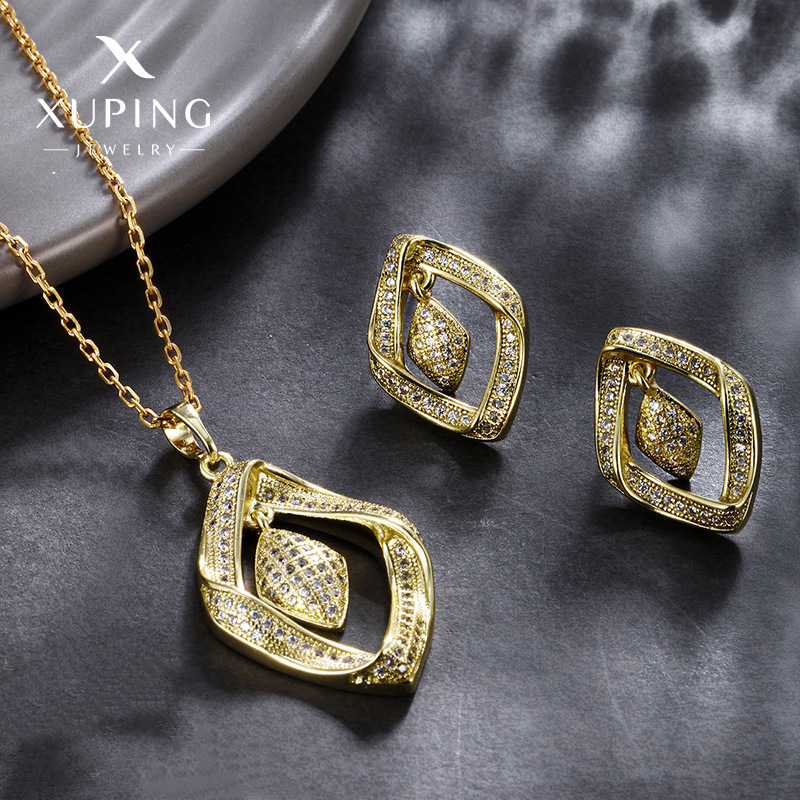 Juego colgante de pendientes de diamante de circonio ligeramente incrustado de aleación Xuping, traje de dos piezas de moda de alta gama de moda europea y americana