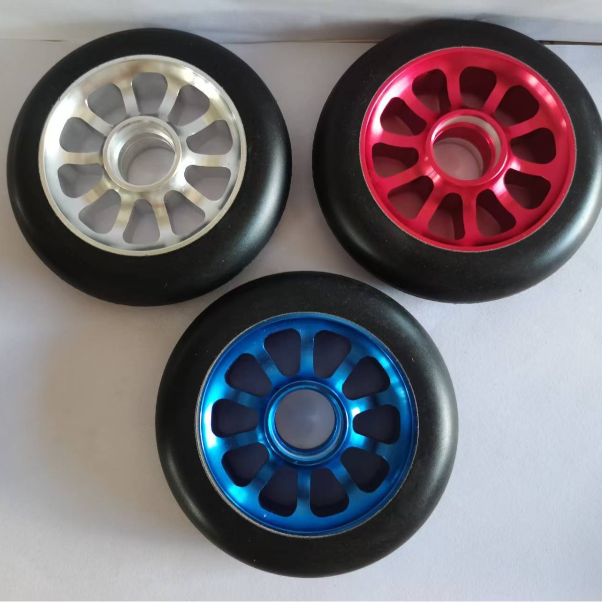 厂家定制滑板轮滑板车配件铝合金轮极限车轮100pu轮极限特技车轮
