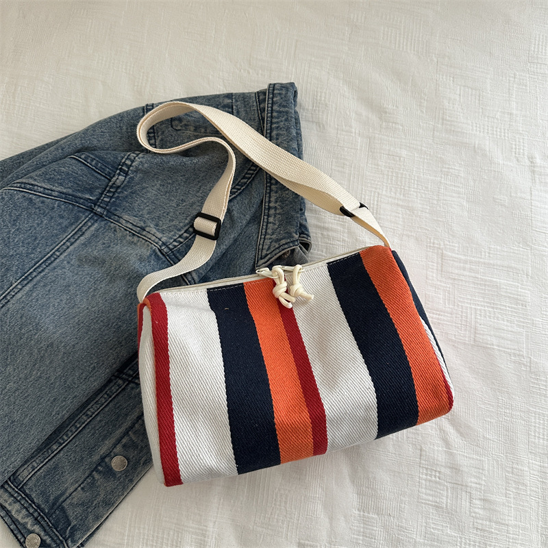 Color contrastante rayas de gran capacidad para mujeres 2024 nueva moda moda bolsa de moda alta sensación de alta calidad bolsa de hombro universal