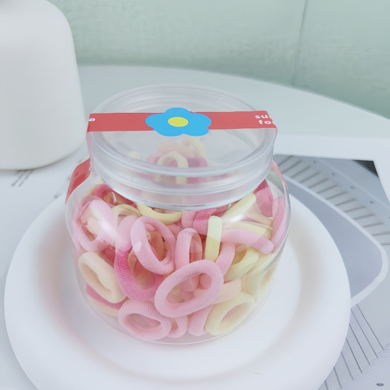子供の皮筋の女の子の高弾力は髪の毛の輪を刺します。|undefined