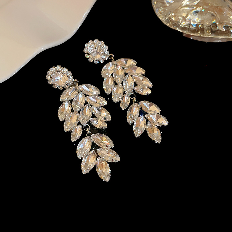 Pendientes de borla de hoja de circón largo de viento de metal con aguja de plata Pendientes de moda exquisita Pendientes de lujo ligero de viento frío