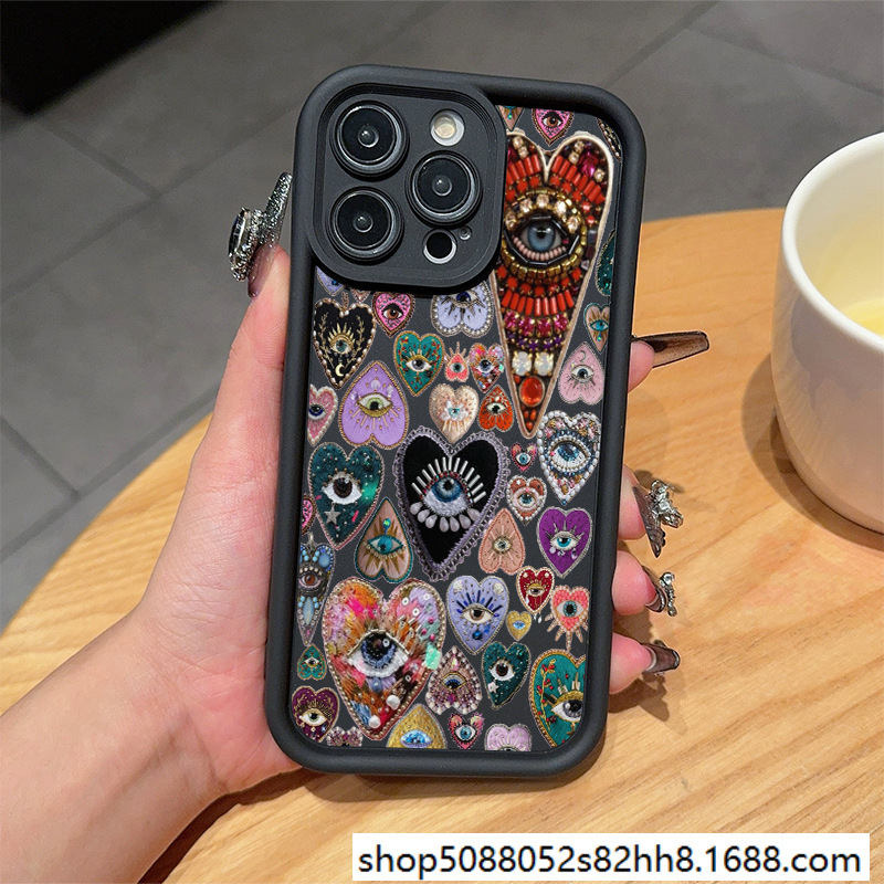 独眼爱心欧美风苹果15手机壳14Pro个性iPhone11/12/13全包16防摔X
