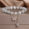 Brand crystal bracelet, jewelry flower-shaped with tassels, Korean style, cat's eye, flowered, wholesale