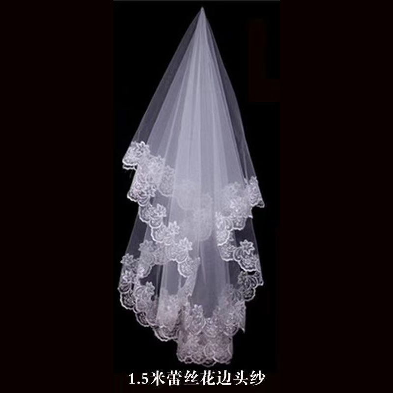 White floor-length wedding dress + veil
