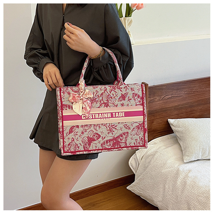 Comercio exterior transfronterizo al por mayor bolso de mano para mujeres 2024 nueva moda impresión popular tamaño de mariposa bolso de hombro