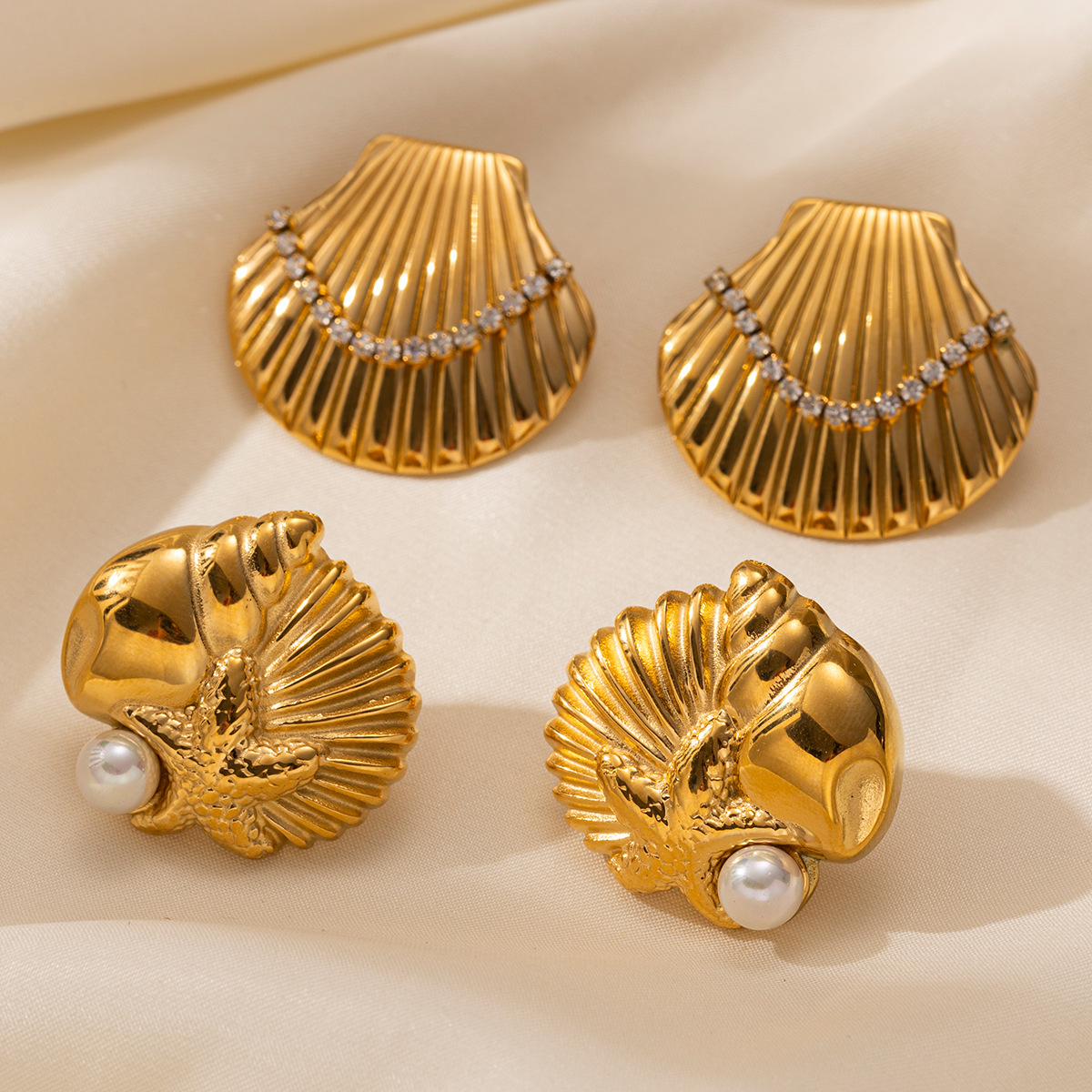 TENA Europa y los Estados Unidos transfronterizos de acero inoxidable marino pernos de conchas de lujo ligero de alto nivel con diamantes conchas de estrellas de mar pendientes para mujeres