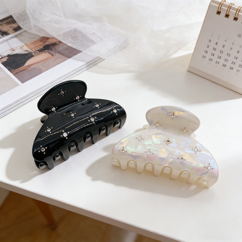 Pinza de pelo con strass estrellas para mujer peinado semirecogido_voghion.com