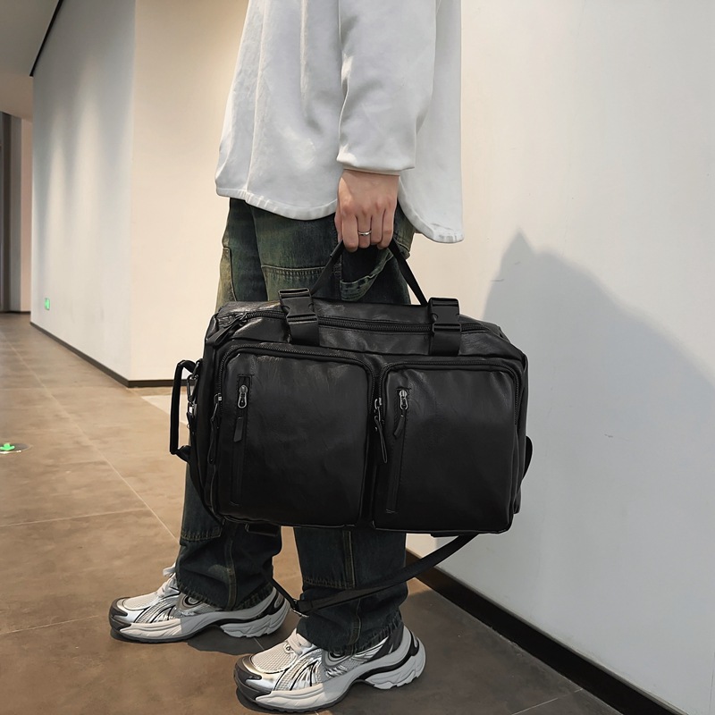 Nueva mochila de hombro de textura PU, color sólido, simple para hombres, bolsa de viaje corto, bolsa deportiva