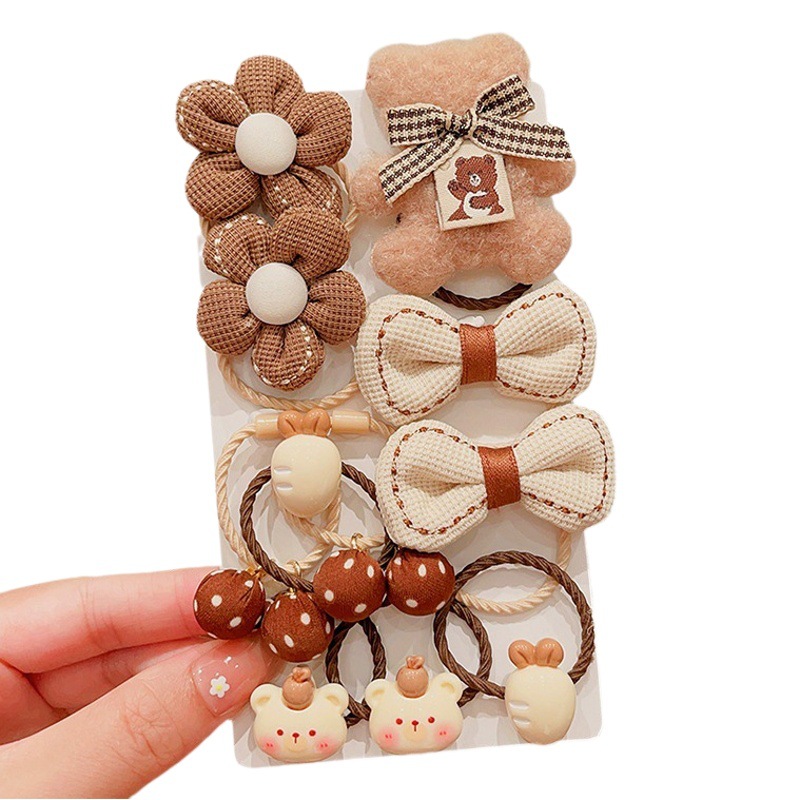 La banda de goma de la flor marrón de la leche de las muchachas de la venda de los niños no lastima el pelo banda elástica alta del pelo de la cola de caballo