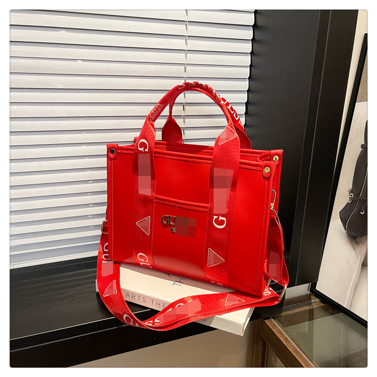 Bolso bandolera con letras de comercio exterior transfronterizo para mujer 2025 nueva tendencia de moda bolso de mensajero portátil impreso