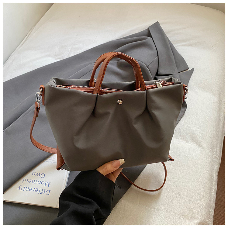 Borsa a tracolla casual da donna in tessuto Oxford, capiente, elegante e versatile, ideale per gli spostamenti quotidiani._voghion.com