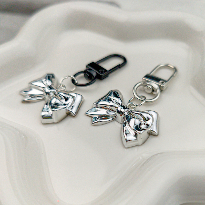 Door buckle H74 metal style high-end silver bow keychain mobile phone girl student bag pendant accessories