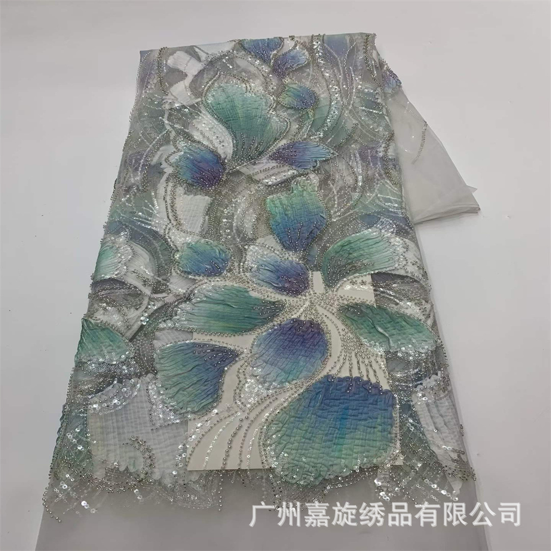 Nueva tela bordada de una sola cara con bordado tridimensional, tela de encaje de malla con cuentas hecha a mano, material para vestidos de novia del sudeste asiático y ropa de espectáculo.