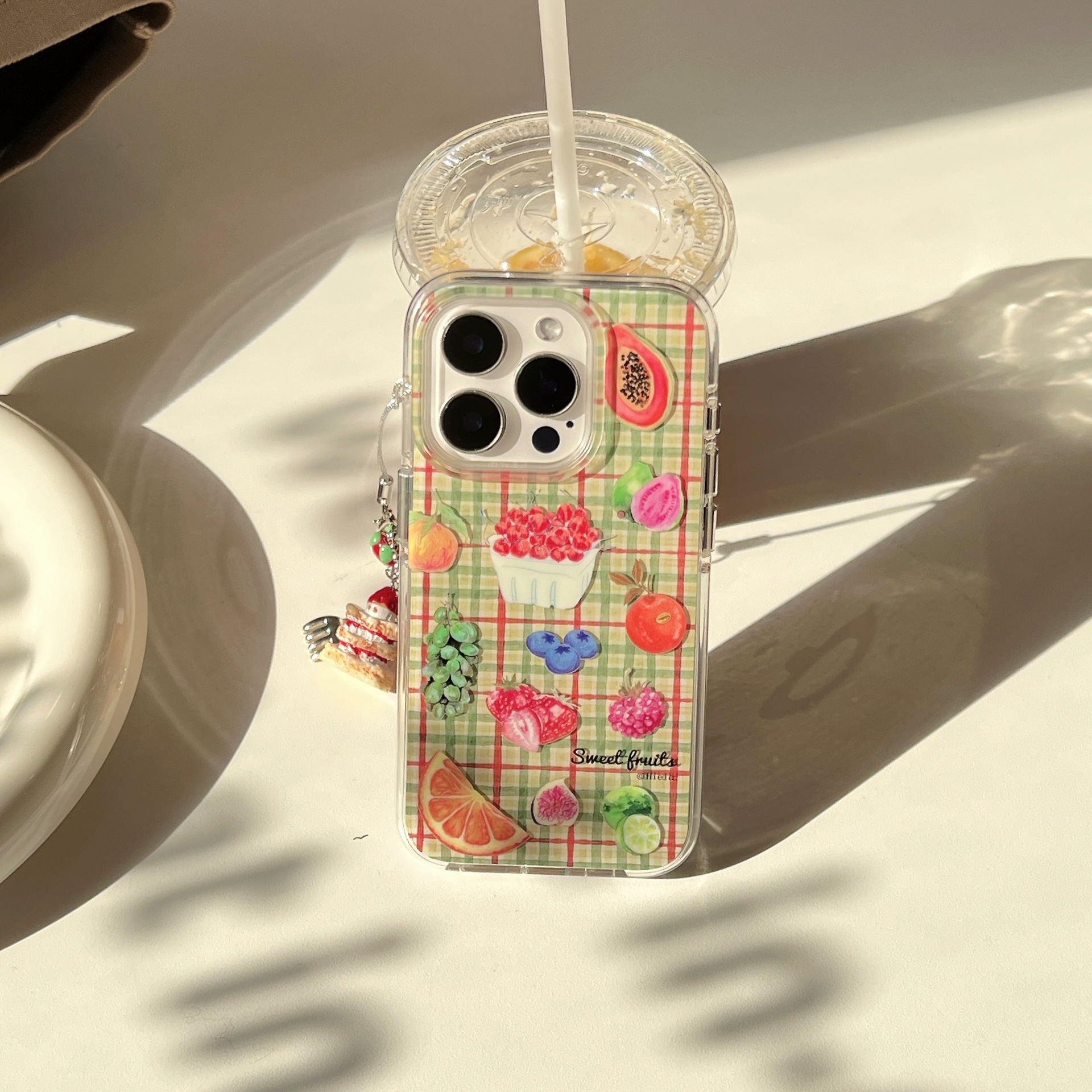 La fruta a cuadros de color de nicho es adecuada para Apple 15/16 funda para teléfono móvil 14Pro colgante 13 verano 16ProMax mujer